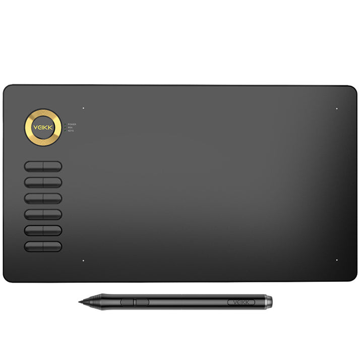 Czarny tablet graficzny z piórkiem na biurku