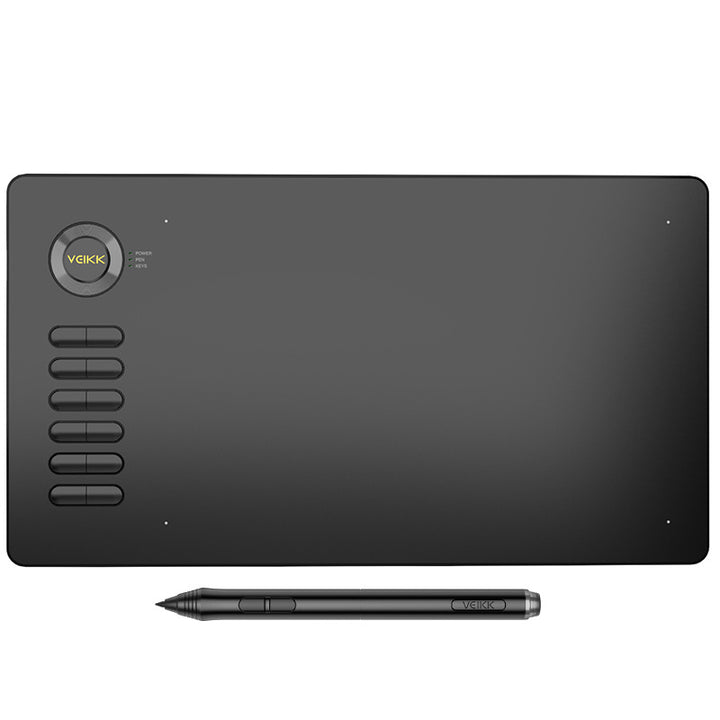 Czarny tablet graficzny z piórkiem na biurku